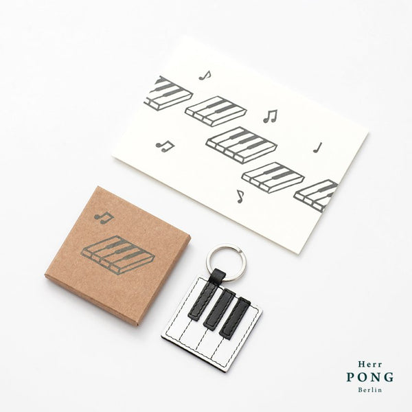 Der Klaviertastatur-Schlüsselanhänger FGAB + Linolschnitt-Grußkarte