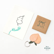 Load image into Gallery viewer, Small Peach Key Holder + Telephone Dialog box linocut Greeting card