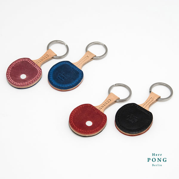 Ein Paar Mini-Ping-Pong-Leder-Schlüsselanhänger